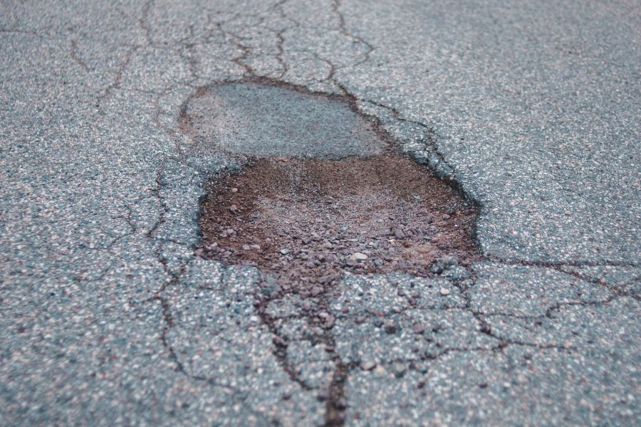 Potholes and rough, uneven roads can cause damage to your car's suspension.